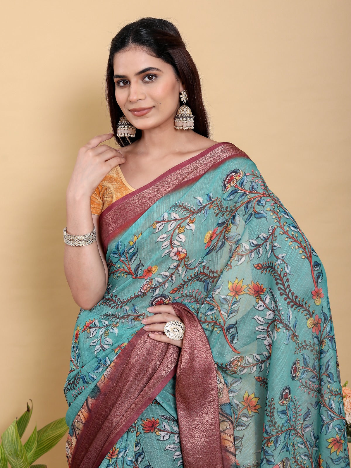 Teal Blue Printed Saree with Traditional Motifs and Zari Border