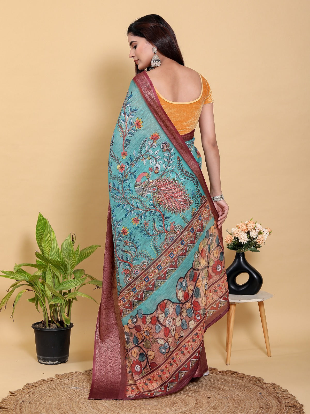 Teal Blue Printed Saree with Traditional Motifs and Zari Border