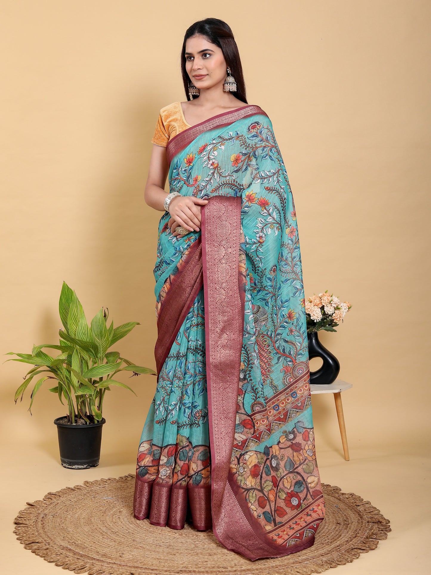 Teal Blue Printed Saree with Traditional Motifs and Zari Border